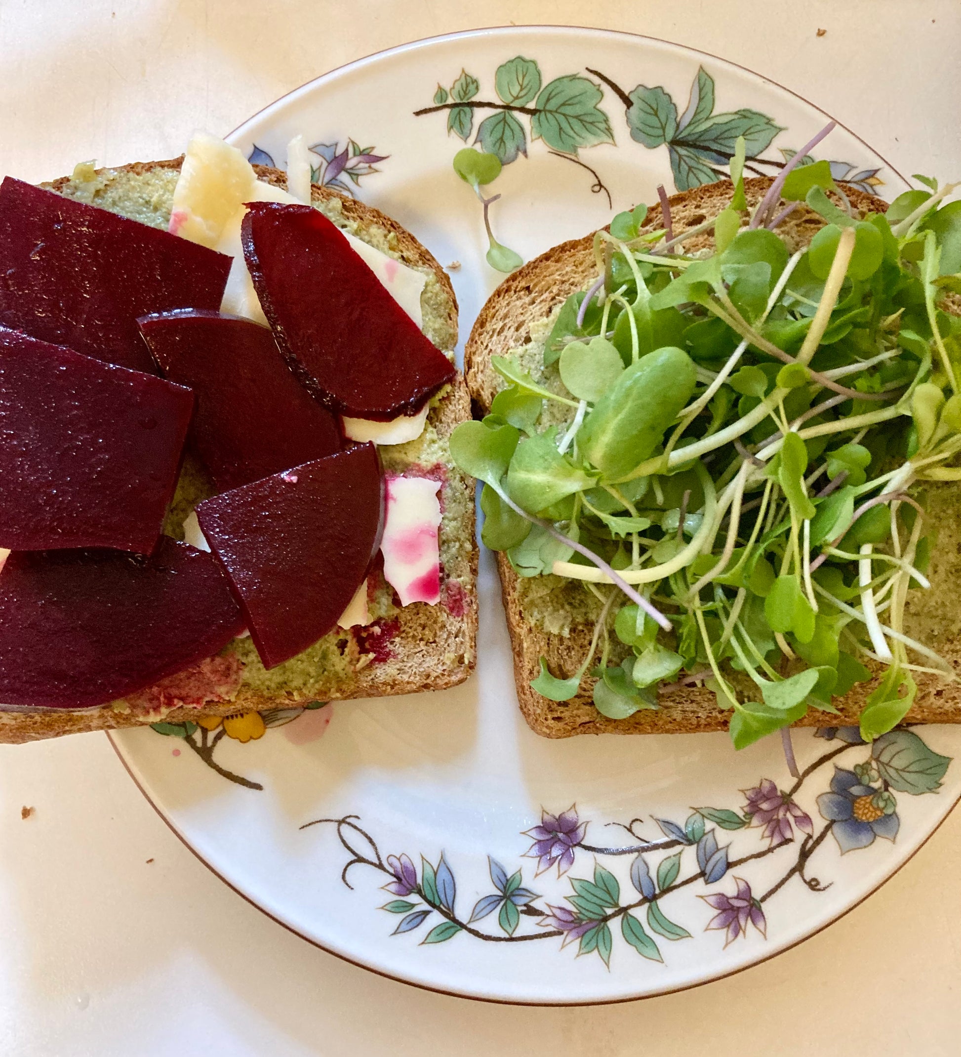 Fed Up Foods Kickin Pickled Beet on a sandwich with hummus microgreen and cheese