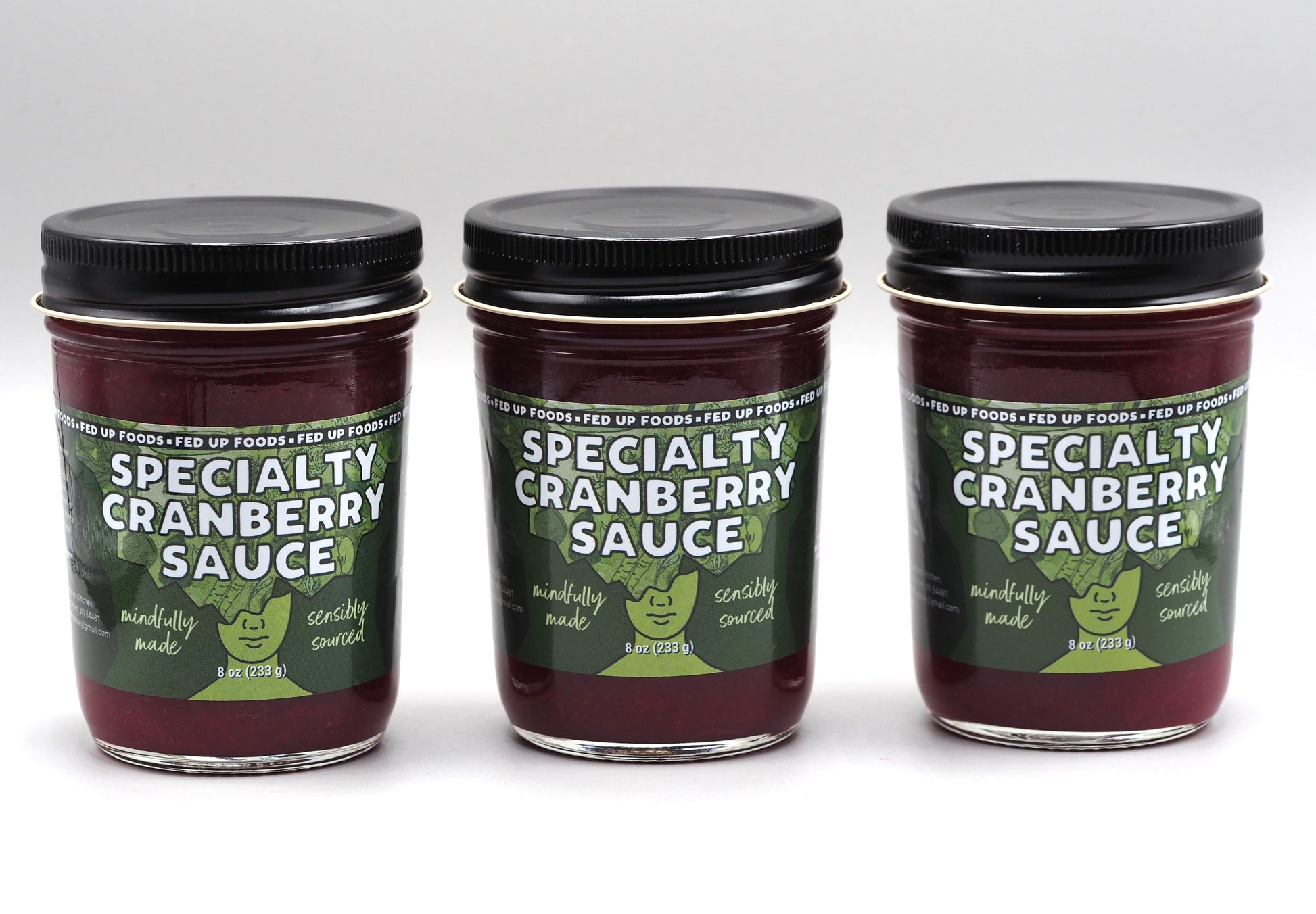 Fed Up Foods Specialty Cranberry Sauce made with local honey and rosemary. 